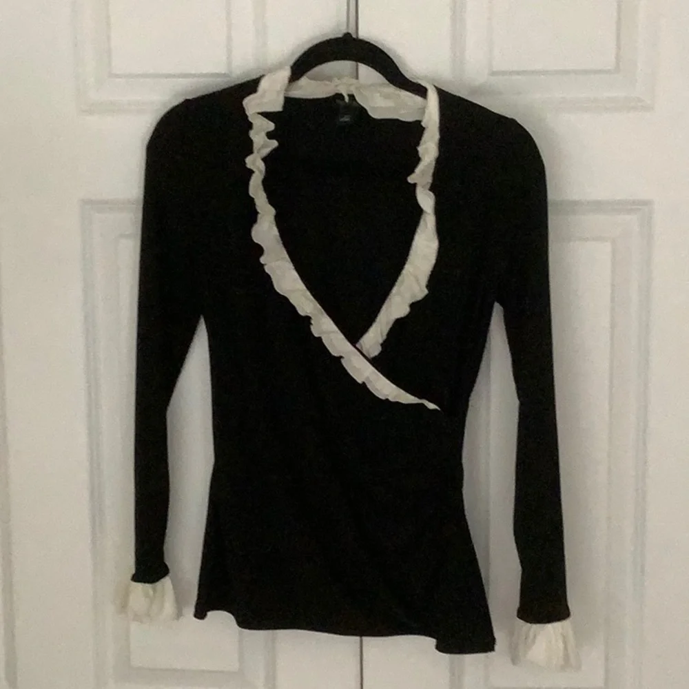 White House black market black top with white ruffled neck and sleeves. - Picture 1 of 6